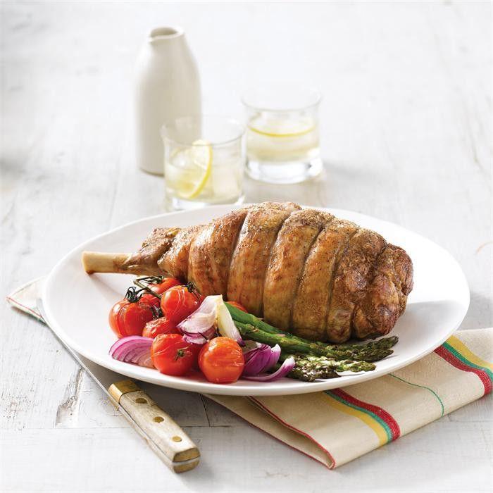 Roast lamb with roasted tomatoes and asparagus