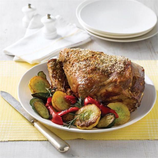 Roast lamb with roasted zucchinis, squash and capsicum