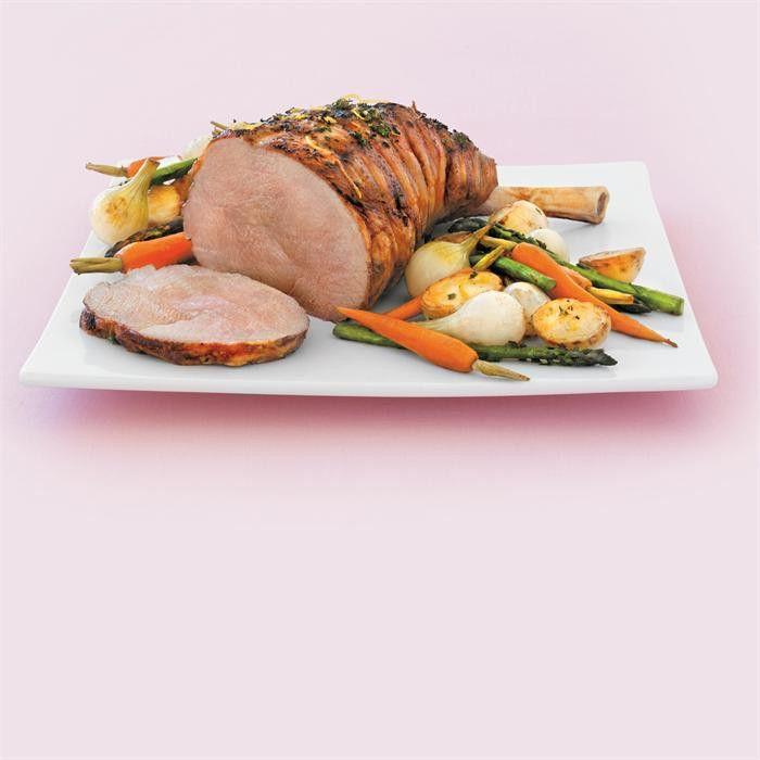 Lemon and thyme easy carve leg of lamb with vegetables