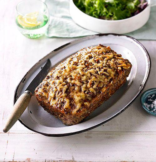 Beef, quinoa and zucchini meatloaf with green leafy salad