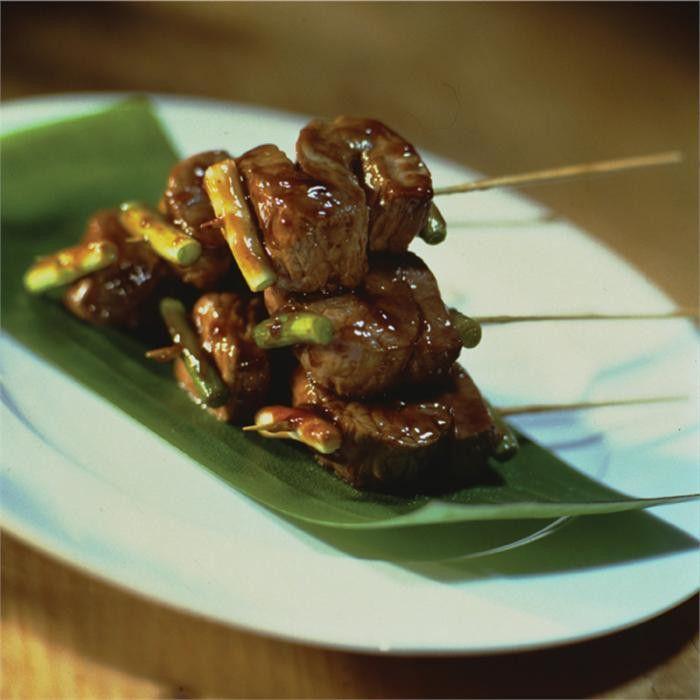 Barbecued beef skewers with honey and soy