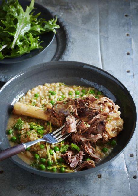 Braised lamb shanks with pearl couscous, peas and mint