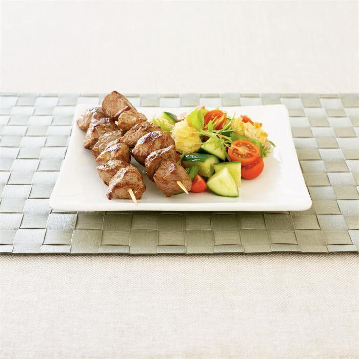 Beef skewers with italian salad