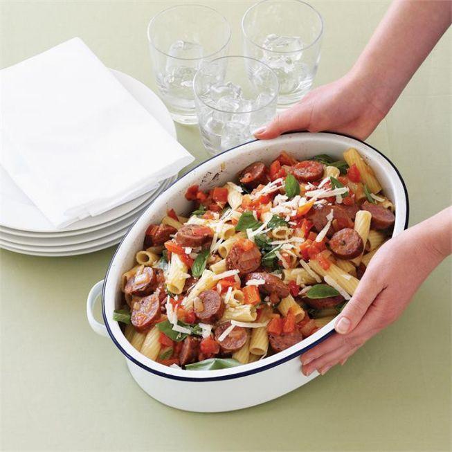 Beef sausages with tomato, basil and pasta