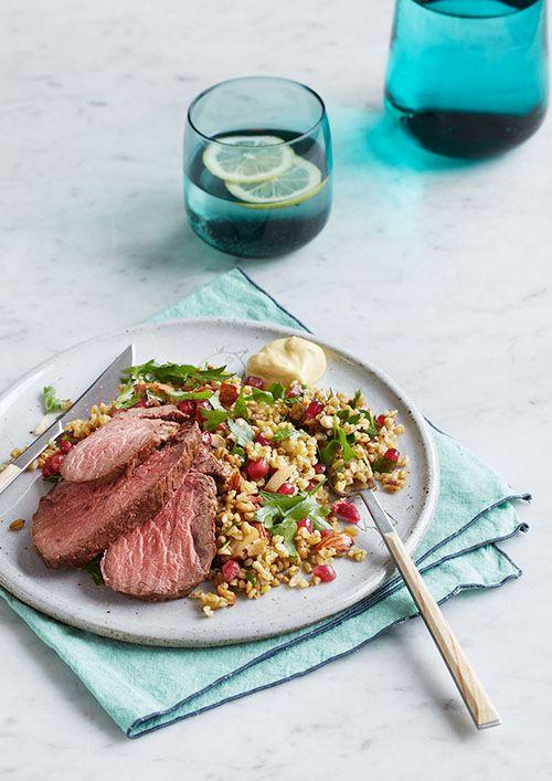 Roasted lamb rump with a freekah, almond and pomegranate salad