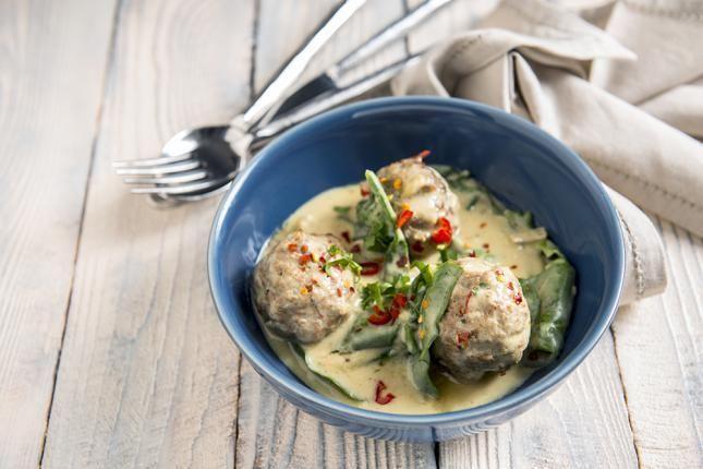 Australian lamb meatballs with warm yoghurt sauce and swiss chard