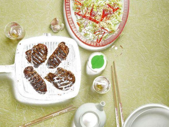 Chinese lamb steak with cabbage, pickled carrot and sesame salad