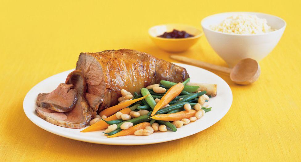 Braised easy carve leg with spring vegetables