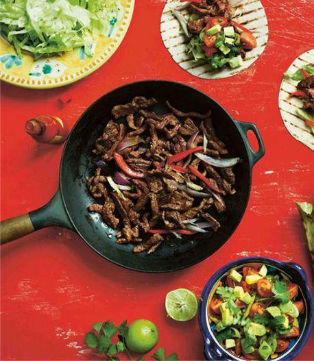 Beef fajitas with tomato, avocado and coriander salsa