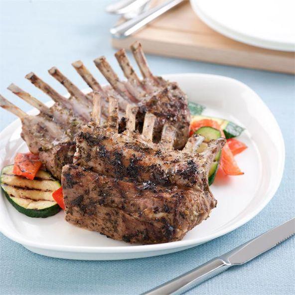 Barbecued rack of goat with herbs and lemon