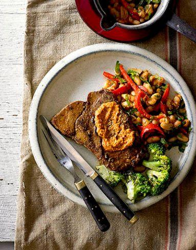 Char-grilled African-style steaks with pineapple marinade and spiced beans