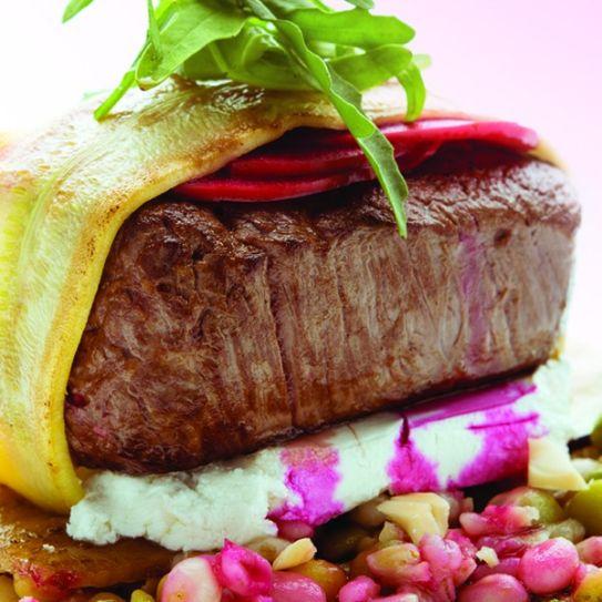 Australian rump medallion with goat cheese packages, hazelnuts, shallots, and yellow lentil vinaigrette