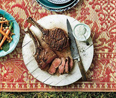 Moroccan spiced beef rib eye cutlets with roasted baby carrots and yoghurt dressing